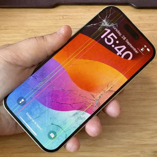 A cracked mobile phone screen with red and green lines on the sides